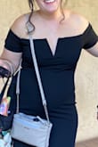 Was looking forward to attending a wedding postpartum. With some extra pounds on I needed an elegant and formal dress. I got this dress and found that it was very becoming on my pear shaped body. Had to have it hemmed which is normal. One challenge with this dress was the top off the shoulder would sort of "gap" away from my body in the front if I bent over. A simple alteration to the cuffs and the back helped eliminate that. Another challenge was that the straps used to hold the dress on a hanger were not long enough to tuck away so I ended up cutting them off so I wouldn't have to fight with them all night! It ended up looking great and I was very satisfied with the quality and price of this dress! - Chantal B.