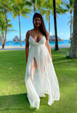 I wore this on a photoshoot while on my honeymoon in Bora Bora and it fit me perfectly! Love it. - Cheyanne L.