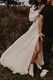 Chose this for my 5 year anniversary photoshoot and it did not disappoint! Only thing I would say, is size up if anything. It's a little tight in the shoulder/arm area. Since it's a wrap dress, it kind of opens when you spread your arms. Other than that? Amazing. Great quality! - Christa M.