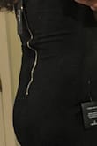 This dress fits me well as a petite person. My only complaint is that the zipper on the back bunches up a little. - Grace T.