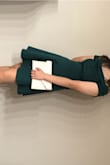 The dress fits perfectly. The color is true to the page and is a very comfortable material to move around in. - EUN H.