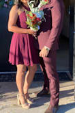 This dress fit like a glove and did not need any alterations. The color was more purple than red in regards to burgundy. Loved the fit! - Bobbie G.