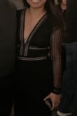 Runs TTS. I thought it would not be flattering on me since I have small boobs but it turned out well. Didn't need double sided tape to make sure I  don't expose anything. Held well throughout the night. The neckline is a great detail. - Di A.