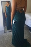 Great dress! Fits perfect, although XS might have worked better for my bust. The material is of good quality and the length is perfect if you wear 3-inch high heels ( for someone my height). - Laura O.