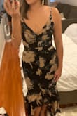 This dress regally accentuates your body in the right areas. It fit nicely but I had to make small adjustments to make it fit better, taking in the back and tighten the top and taking in some of the sides just above the hips. - Nancy K.