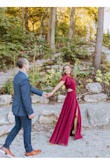 I wore this for my engagement photos and was blown away at how well it photographed. The flutter sleeves, cut out waist and high slit are all beautiful details that make this dress so fun but still classy. I'm so happy with this purchase and wish I would have bought it in white and wore it as my wedding dress! - Maggie S.