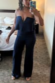 Such a fun piece! Purchased and wore for a wedding and got so many compliments. The fit of this jumpsuit is almost perfect and very flattering. I originally ordered a large based on the size chart and reviews and returned it for a medium. The bust started out just right but got a little loose throughout the night. Overall, 10/10 & would recommend! - Kayla S.