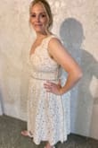 I ordered this dress for my summer beach wedding. I originally ordered a large but ended up contacting customer service the next day and asked for an XL( it happened to be the last XL in stock). The liner of the dress made me feel like I looked bigger so I bought a bridal belt to accentuate my hips/ give the dress a little something extra. I absolutely loved the built in pockets. Overall I was very happy with my decision to purchase my dress from Lulus. The customer service department was easy to work with and the quality of the dress is amazing. Absolutely love this dress! - Heather S.