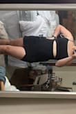 I was nervous about this dress because Im not a tight dress person, but it was perfect. It was tight but doesnt make your stomach look large. 
I wear a size 8/10 in jeans for reference and got a large but could have done a medium since it is stretchy. Loved it though!! Super cute!! - Tess C.