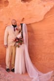 I got this as my wedding dress for out elopement and it is amazing. I was so surprised when it arrived it is so beautiful in person. It fit amazing I didn't need any alterations. I can't wait to see the rest of our wedding photos! The beading is gorgeous I've gotten so many compliments on it! - Francizka H.