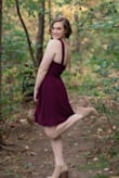 This dress is simple and so cute! The neckline adds a little bit of something to add interest to the dress. It's perfect for my daughter, not too revealing or too boring. The color is beautiful too! - Lora F.