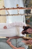 Love love love, just had a baby 5 months ago and this dress made me feel like a true bride. Chest looked great and it slimmed the stomach area. The back was a bit tight on me but everybody gave this dress 10 stars. - Sarah E.
