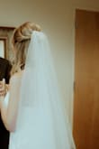 This veil is beyond gorgeous, simple, and beautiful in all the ways I was hoping for. I wore it my entire wedding, I just didn't want to take it off! The moment I tried it on, I felt like a bride and it brought my look together. The length was perfect and the quality exceeded my expectations. My dress and pearl belt are also from Lulus, so thank you for making me feel beautiful on the day I got to marry my best friend. - Michelle D.