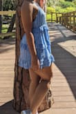 I love the material and feel. It's cute and casual but way too short. Like when you sit there's no material to cover your bottom and never bend over. Would recommend shorts underneath. - Naila W.