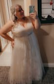 I ordered this after deciding last minute to get married in Vegas.. it was here in 2 days and was perfect! It was pretty long but I'm short so I expected that. Definitely more ivory than white. I also added an extra belt for some bling but got so many compliments! - Jillian B.