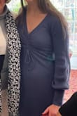 I love this dress!! Wore it to my sister's shower it was perfect. The slit is kind of high up the leg so so sexy for going out but maybe inappropriate for work. - Mackenzie P.