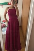 I love it! The color is the same as the picture. I always buy Lulus dresses, the quality is excellent. The length is a little long for me. I thought that the front it would be straight, without curves, because I don't have much bust. Instead, the dress valued my curves. - Larissa H.