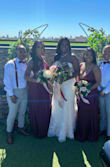 I absolutely loved my dress! Our lovely bride had a last minute bridesmaid drop out and my dress came within two days! I love the high slit the color matched perfectly and martial was very soft! I'm on the right of the bride. - Ashley M.