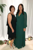 I love this dress. The emerald green was gorgeous and was the perfect choice for me. I purchased it to wear to my cousin's wedding and I received so many compliments! The material is light and flowy. I ordered a size large because I am pear shaped, but I had to have it altered, which I expected. It was taken up at the shoulders and the hem line was taken up a few inches as well. It's a long dress, even with 3 inch heels. The sleeves are so elegant and its overall very flattering. Because the material is so flowy, the bust area is a bit iffy so I had the seamstress put a snap in the front for me, too, which helped. Gorgeous dress for a formal event. You'll love it! - Allison C.