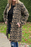 Very nice, and good quality. I ordered a large, as I usually have to size up in coats, due to my broad shoulders and it fits perfectly. I usually wear a medium in tops. Both my friend and husband said it needed a big button, for extra finishing. It does not close or button FYI. I bought a couple of buttons to try but decided it did not need one after all.
Tip: I always scotch guard my coats, shoes, and bags. Keeps them cleaner longer and I have less worries about spills or rain marks(on leather). - Traci K.