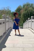 Definitely thicker in material, so keeps in the warmth! Very flowy dress - Alice C.