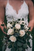 I bought this dress for my wedding dress and it was perfect for the style of wedding we had planned! It fit true to size. It was a tad bit long with my heels on so I did end up getting it hemmed, only a little bit though. If you're thinking of buying this dress do not hesitate! - Tennille P.