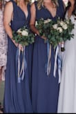 I bought two dresses for my sisters to wear as brides maids dresses and they both fit and looked beautiful! They flowed so nicely and fit true to size! One is 5'11" and size L the other is 5'9"and size S. - Tennille P.