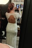 I love this dress. It was also my fiancee's favorite for our upcoming elopement. You will need a backless sticky bra. And I also got a low-rise slip shaper as well. The backless and see-thru shoulder aspect does make the undergarment part more challenging. It is also fair to note that the fabric is thinner than what it appears in the photos. I can't wait to wear it. At 5'8 it is also long enough for me to be able to wear 4' heels. - Nicole M.
