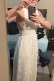 I would totally buy this dress again in a different color. The fit is amazing! I typically wear a small. However, I am still trying to lose this last five pounds after having my son two years ago. So the dress was a little tight underneath my bust. Other than that this dress was perfect. - Christina H.