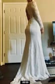 I was not expecting to love this dress so much. Usually mermaid gowns make me pretty insecure - I carry my weight in my hips.
This dress is so soft, stretchy and light. It fit perfectly. The back is so dramatic. I didn't want to take it off. I'm going to be keeping this dress. - Megan J.