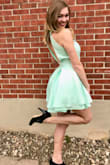 I love this dress. Any opportunity I have to wear it I will. I got it for my sorority formal and it was perfect. The fabric is not stretchy whatsoever so make sure you get the fit right! The skirt lifts a lot when you twirl (and you have to twirl in this dress) so be prepared! - Haley C.