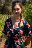 I got this for a birthday celebration in Sonoma (Wine Country) and it was lovely. Flowy and thin while still sturdy. The slit was a tad high so just be aware! Overall really happy with this dress, the wrap highlighting the waist nicely. - Haley C.