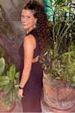 I loved this dress! The material is soft and stretchy and hugs in all the right places. The open back and front side slit give the dress a sultry flair, but the length and material give you the ability to dress it up or down. I love that you can wear a regular bra with this dress, too! Highly recommend this dress. - Shannon F.