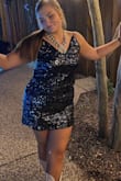 I wore this dress to homecoming and I absolutely loved it! I am 5'9 so it was a tad short when jumping around but it hung very nicely. It was super flattering for my girls that don't want a skin-tight painted on the dress but still want something to show their figure. The straps are not adjustable so just we weary I did have to tie them up a little since I have a little bigger bust. It was very comfortable as well! 10/10 recommend - Addie M.