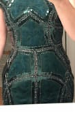 This dress is gorgeous and the green color is phenomenal. Very well made and I found it to be comfortable to wear all night long. It fit like a glove but I had no problem dancing in it. - Jennifer W.