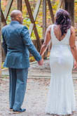 Got married in Vegas and purchased this dress for my wedding photos once we got back home. The fit is awesome and accentuated my figure nicely. The quality is up there with my original wedding dress that I purchased from a national bridal store. I wish it was a tad bit longer for those of us who are on the taller side, but it wasn't a really big deal. I would 100% recommend this dress! - April B.