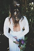 I wore this dress to elope with my sweetheart in Hawaii, it looked beautiful and I got a lot of compliments!! - Ally M.