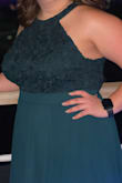 This dress was amazing, it fit so well. The only problem I had was that it was meant for someone 6-7 inches taller than me! I took it in the get altered and then it was perfect! - Megan C.
