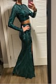 I wore this to a black tie formal Indian wedding reception and got compliments all night! This dress was truly perfection. The Small and XS both fit but I went with the XS because gave better shape to my hips and butt "kind of a mermaid effect" but damn was it tight! I wore a spanx thong under which helped but there was truly no give. Worth it for one night! Lol.
I'm 5'7" and wore a 4 inch heel and the hem was just above/skimming the ground. - Hannah V.