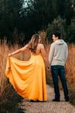I wore this dress for my engagement pictures and it was EXACTLY the dress I always envisioned wearing! This dress is perfect for an elegant dress for a wedding or to have bridesmaids wear! - Ashley P.