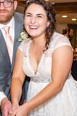 This dress definitely needed alterations when it first arrived, but it worked perfectly for my wedding reception! I was comfortable and able to move in it! - Ana M.