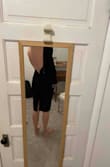 The material is thick and warm, thicker than I thought, the cut in the back is sexy and the dress is professional in the front party in he back! - Maggie M.