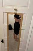 This dress is a great material and fits true to size, I love the cut In the back but I think I will return it because I found a dress I like more. However, the cut in the back is flattering. The zipper on the top part behind the neck is impossible to do yourself so make sure you have a friend to zip you up. It's sexy but not as sexy as in the model. - Maggie M.