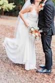 I felt like a princess on my wedding day! The dress was SO beautiful, especially after adding my belt and veil.
I did have to get it hemmed because it's super long. The top was a little big for me since I'm small up there, but it had adjustable straps so it worked out. - Rachel C.