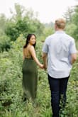 I bought this dress for my engagement photo session and the photos turned out phenomenal! I typically wear XS or S, but when I was looking to purchase, only XXS was in stock. I'd say the dress runs slightly larger because I was able to fit it comfortably in the photos. I love the dress!! It is versatile and you can really wear it for a range of occasions. Also, the back of the dress is gorgeous and probably my favorite part of the dress! - Nujsaubnusi V.