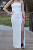 We ordered this dress for my daughter's school dance after we couldn't find anything locally. We needed it in a hurry so we paid for expedited shipping and we were pleasantly surprised at how well it fit and how well made it was, especially for the price- even with the extra shipping cost. The material is thick but not stiff or scratchy. We had a little difficulty getting it really tight on the top, but we were able to get it tight enough for her to feel comfortable. Also, she can't wear heels so we were worried it might be too long but it worked pretty well with her flat shoes. All in all, this was a great dress and we will definitely order from Lulus again. - Angie O.