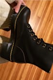 Have worn these every day since I got them! They feel larger when you first put them on but that is also coming from the bulk of the heel. I wear these with thick-ish socks and they feel great! Would order regular boot size but expect a little room. Wouldn't change a thing. - Julia B.
