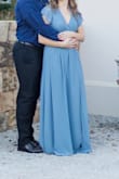 This dress fit me well, but definitely had some stretch to it so I could've gotten by with a size smaller. Great for engagement photos! - Natalie K.