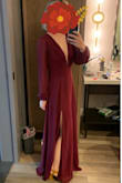 Wore this to a fall wedding and got so many compliments! The dress is very long, I wore with heels and it was still on the floor, but I didn't have time to get it hemmed. The color is a rich burgundy. The material feels light and swishy, obviously polyester, but not cheap feeling. It gives me fancy 70s nightgown vibes, and I mean that in the BEST WAY. - Whitney S.