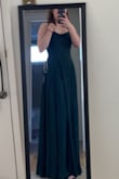 The dress is great it fits a little snug when zipping it up but that's alright. It will be great for a wedding. Good quality dress. - Martina K.
